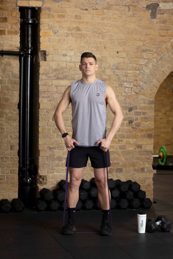 resistance band upright row step 1